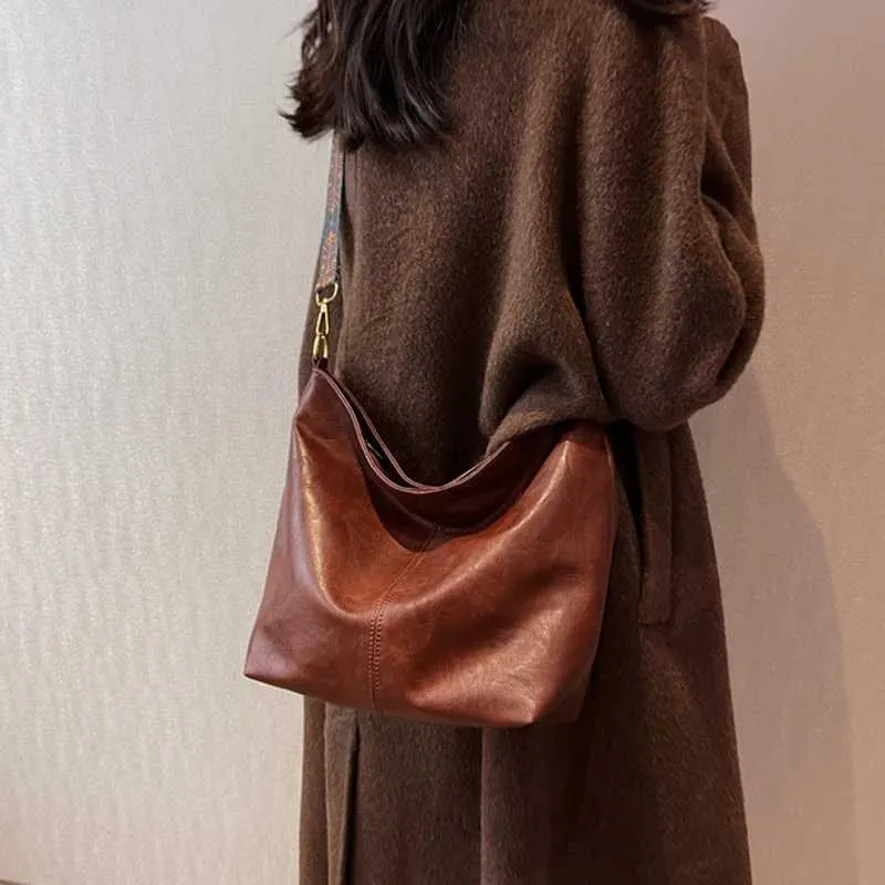 Borsa a tracolla vintage tinta unita in pelle PU da donna alla moda, con tracolla larga e semplice, a secchiello, a tracolla Ba241216_voghion.com