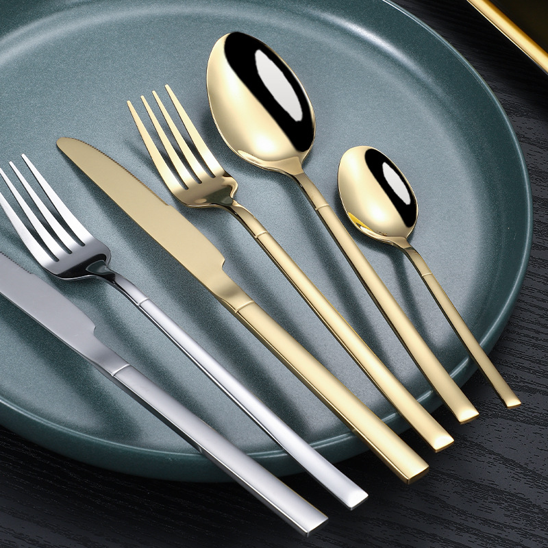 24 of stainless steel tablew, steak knives, forks, spoons, 4 main pieces set, knight Western style gold-plated_voghion.com