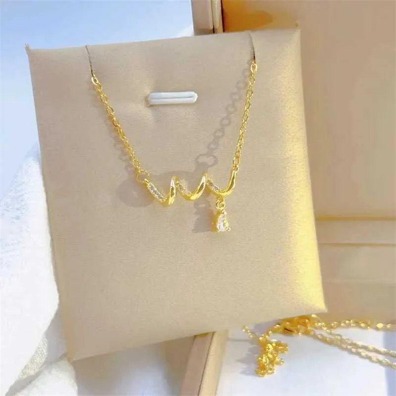 Collier pendentif spirale délicat bijoux acier inoxydable_voghion.com