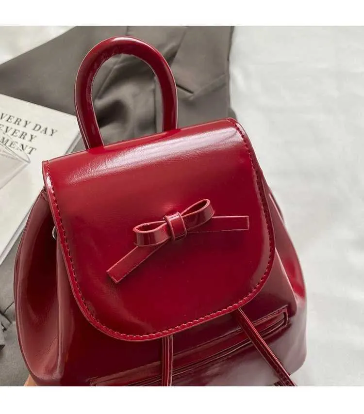 Mochila feminina sólida com aba e laços, mini bolsas de ombro, versátil, feminina, grande capacidade, bolsas de couro, casual, estudante_voghion.com