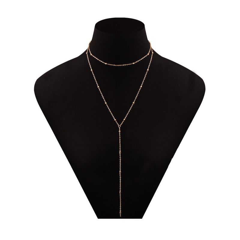 Collier long multicouche à pampilles géométriques exagérées et à la mode pour femmes_voghion.com