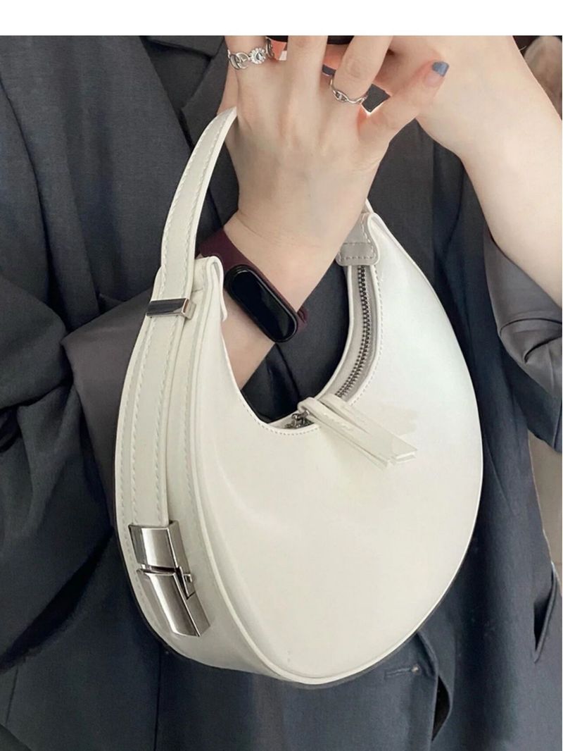 Eine Nischendesign-Schulter mit Halbmond für Frauen im Jahr 2024, neue personalisierte und minimalistische Tasche,_voghion.com