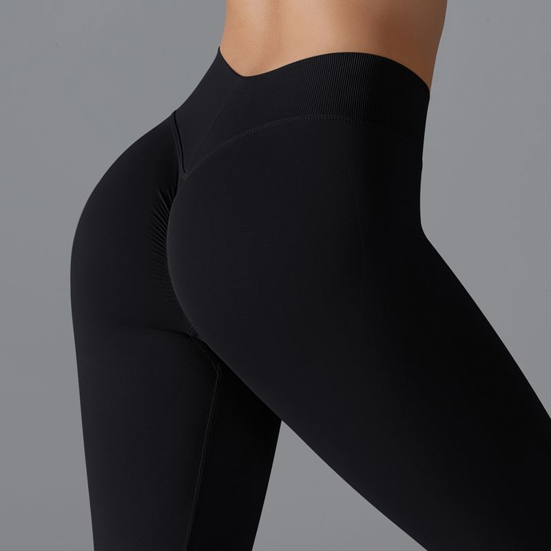 Seamless Knitted Solid Color Tight High Waist Peach Hip V-Waist Yoga Sports Running Fiess Pants_voghion.com