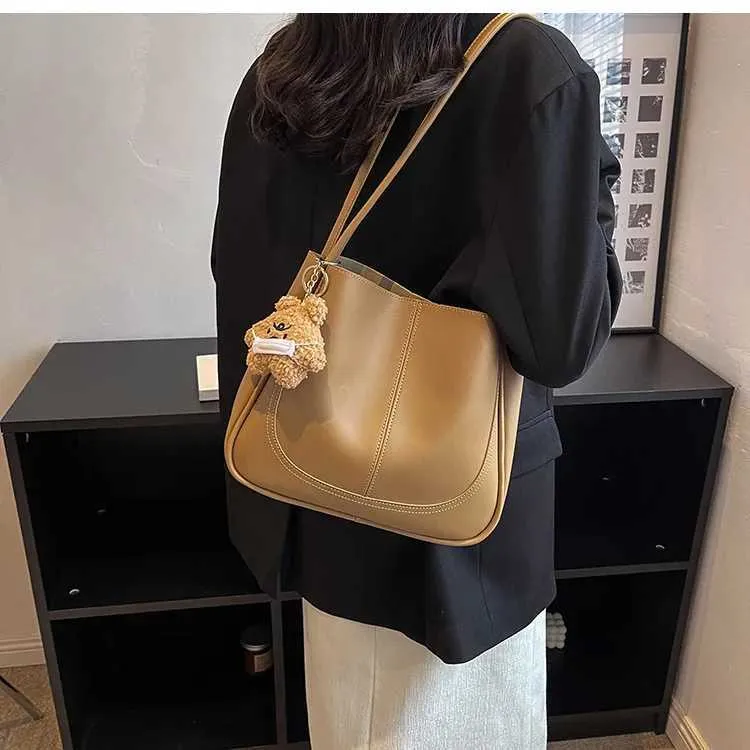 Bolso de hombro de alta gama con textura de gran capacidad, nuevo bolso de mano para mujer, otoño e invierno 2024, C241106_voghion.com