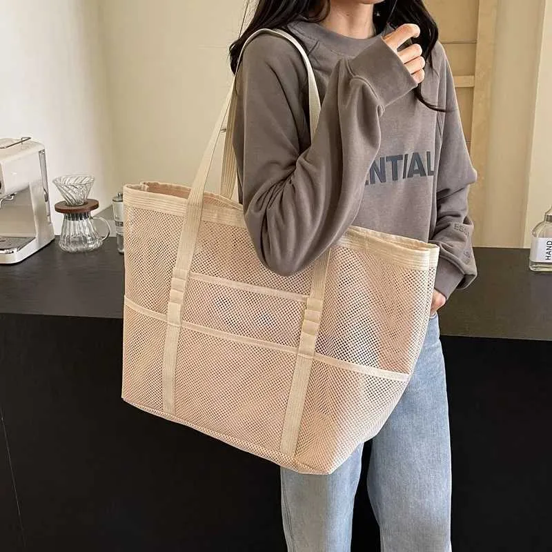 Bolsa de praia transparente de viagem de ombro de malha multifuncional feminina de grande capacidade de armazenamento de maquiagem Y241011_voghion.com