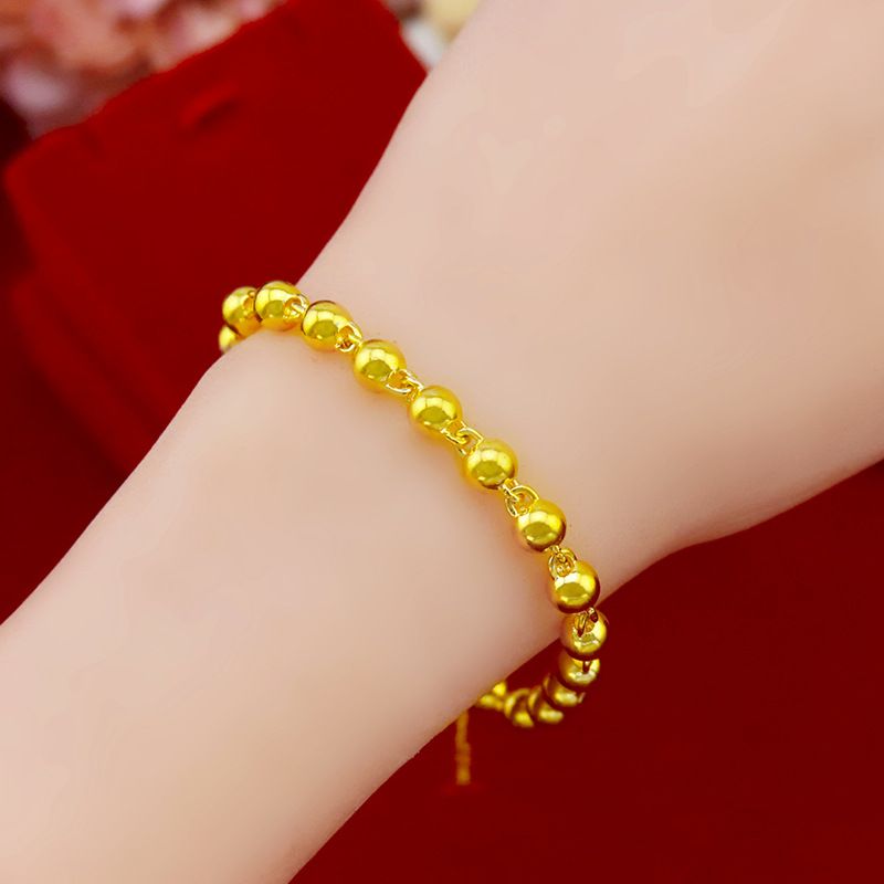 Bracciale con perline dorate da donna elegante tondo liscio_voghion.com