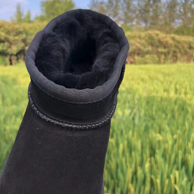 Rindslederwolle Braun Flache Absätze Lederfell Integrierte Runde Zehen Klebeschuhe Niedrig Geschnittene Mini-Schneestiefel_voghion.com