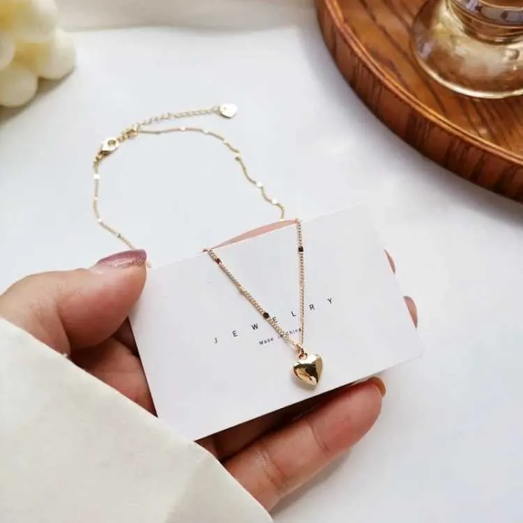 Collana con ciondolo a forma di cuore piccolo per donna, regalo, collane girocollo bohemien in metallo lucido e semplice, a catena corta, gioielli di tendenza_voghion.com