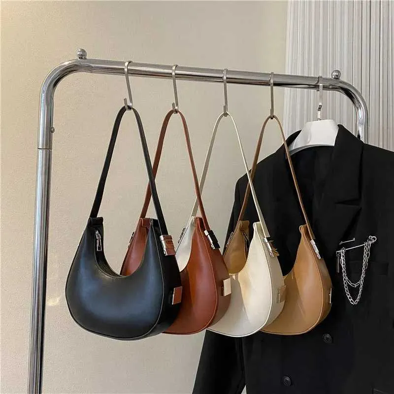 Borsa a spalla a mezzaluna donna elegante in ecopelle_voghion.com