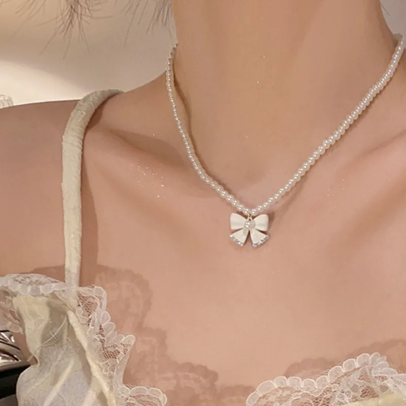 Collier avec pendentif en forme de nœud en perles de haute qualité pour femme, joli bijou, accessoire, cadeau de mariage_voghion.com