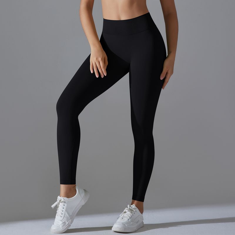 Seamless Knitted Solid Color Tight High Waist Peach Hip V-Waist Yoga Sports Running Fiess Pants_voghion.com