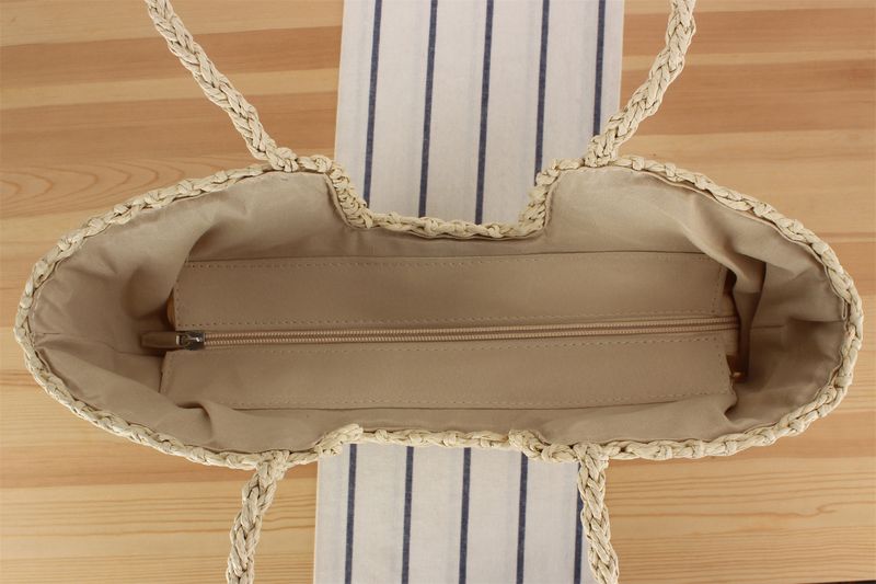 Gewebte Tasche aus Papierseil, neue französische Nischen-Hohlgewebetasche, eine Schulter, handgehaltene Strandtasche mit_voghion.com