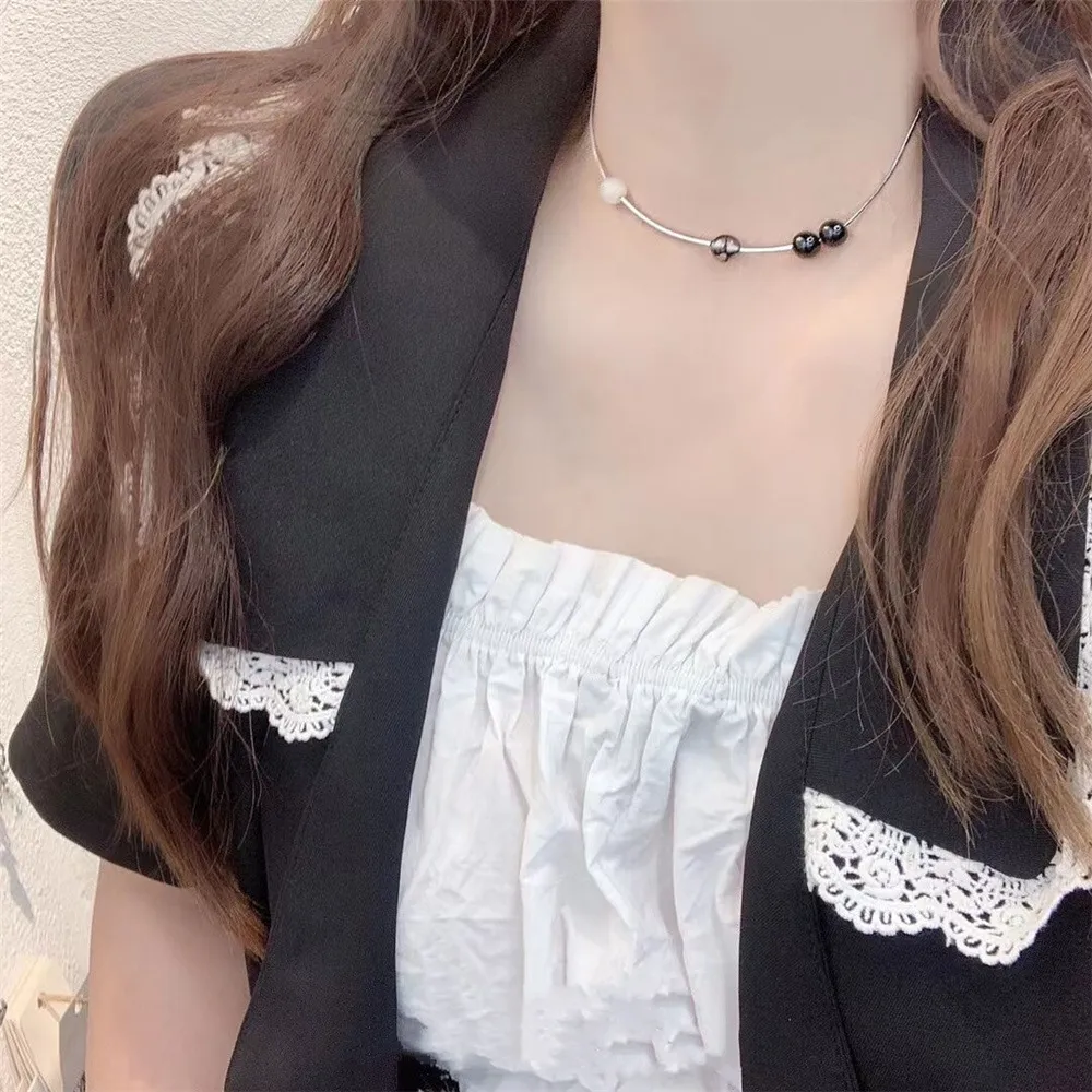 Collier pendentif vintage en pierre opale et choker en acier_voghion.com
