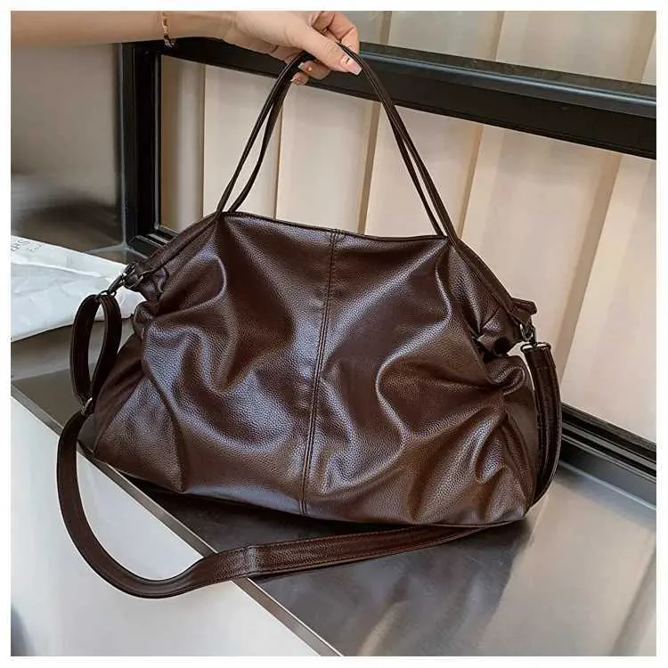 Large black shoulder large homeless shopping solid color high-quality leather cross body handbag womens travel bag_voghion.com