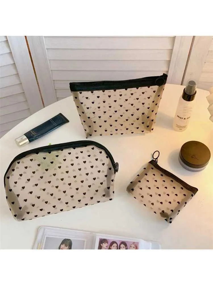 Estuche de malla con estampado en forma de corazón para cosméticos, neceser de maquillaje, bonito estuche transparente con cremallera, color negro, fácil de llevar, Y241023_voghion.com