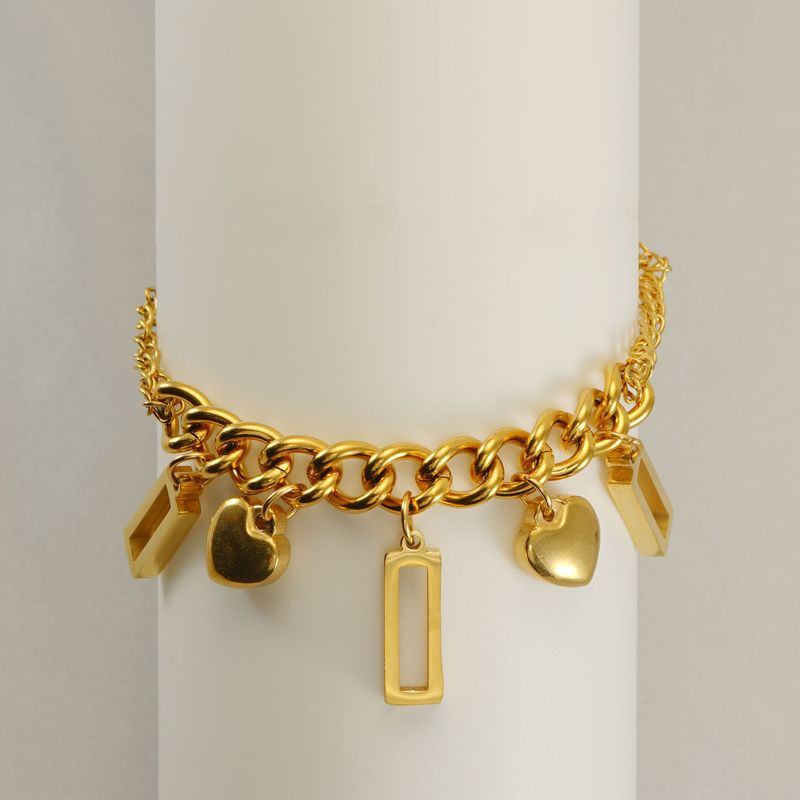 Braccialetto alla moda in acciaio inossidabile con combinazione di titanio, dorato, geometrico, design di nicchia per le donne_voghion.com