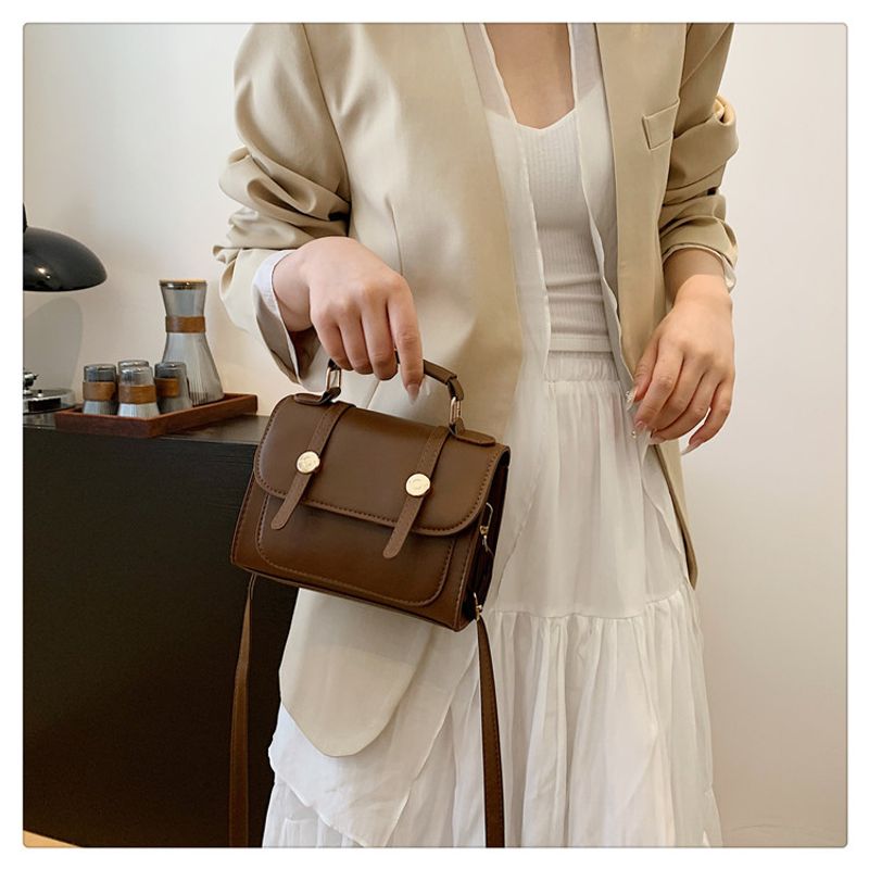 Britische Schulter für Frauen 2024 Neue trendige Studentin Multifunktionaler Rucksack Handheld Reisetasche_voghion.com