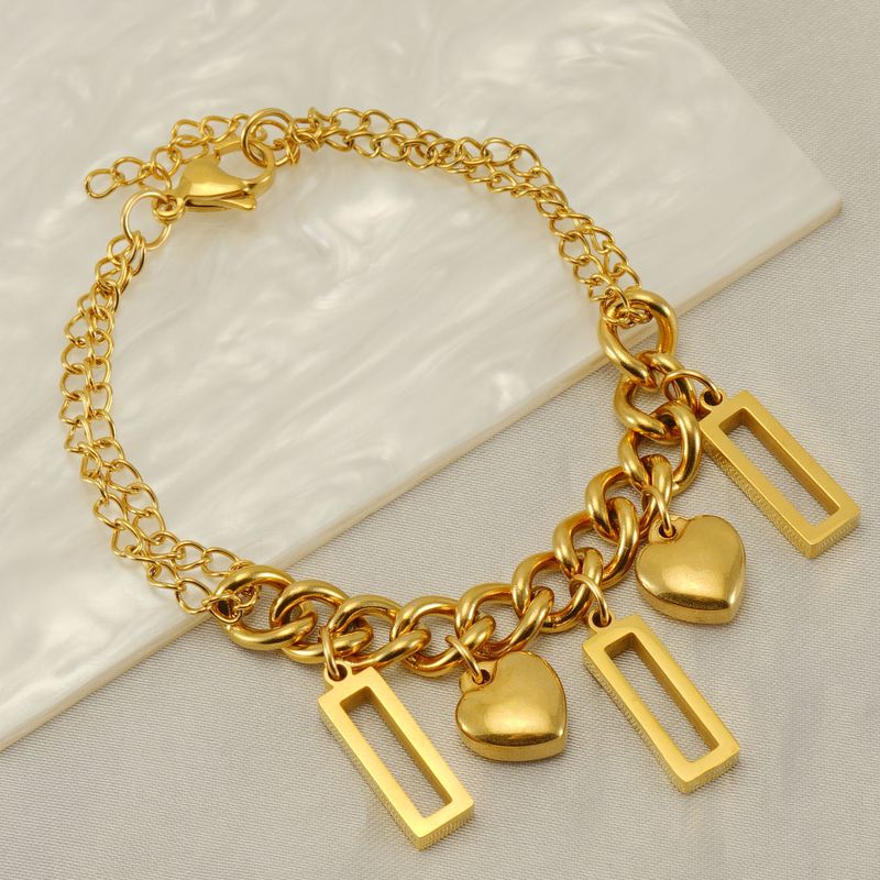 Braccialetto alla moda in acciaio inossidabile con combinazione di titanio, dorato, geometrico, design di nicchia per le donne_voghion.com