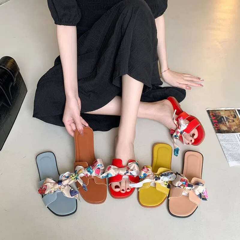 SHLIANG Colorful Ribbon Bow Flat Heel Sandals Women's Summer New Style Outer Wear Floral Pattern One-Row Slippers For Women Y0355_vogvips.com