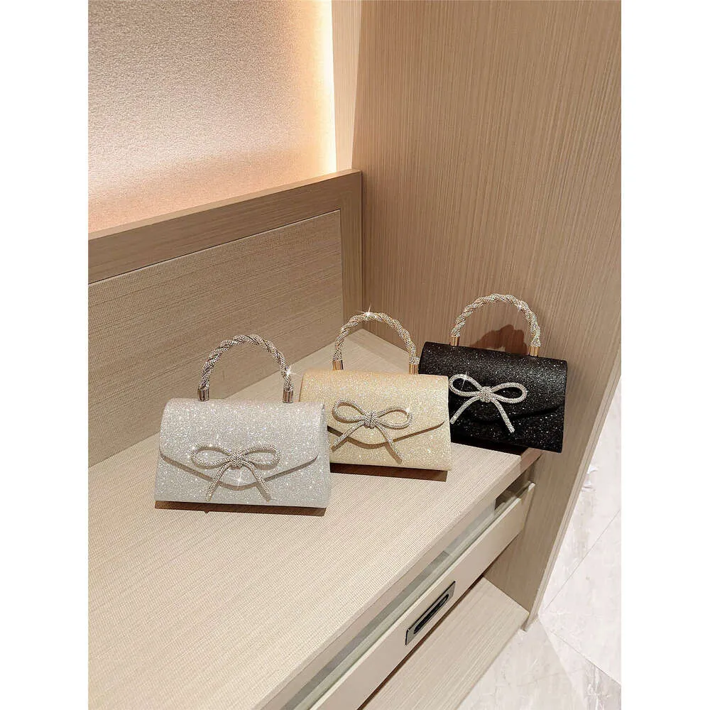 Robe de soirée Pochette polyvalente européenne et américaine Sac à bandoulière pour célébrités Mode Dia Bow Chain Bag_voghion.com