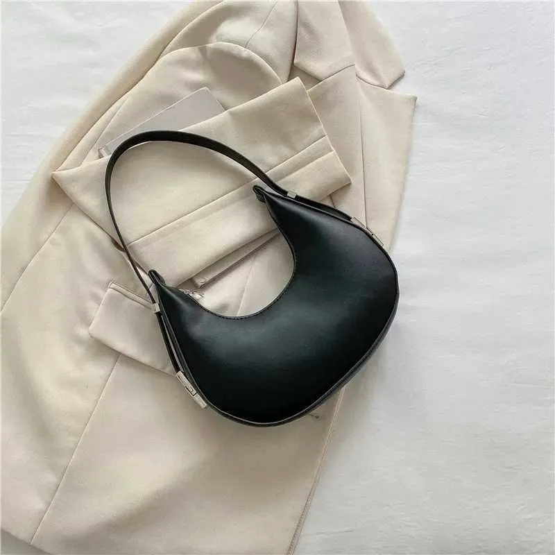 Borsa a spalla a mezzaluna donna elegante in ecopelle_voghion.com