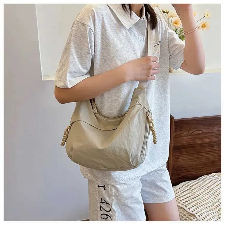 Version coréenne à la mode et minimaliste dumpg populaire cette année, nouveau sac à bandoulière de haute qualité, fourre-tout de grande capacité_voghion.com