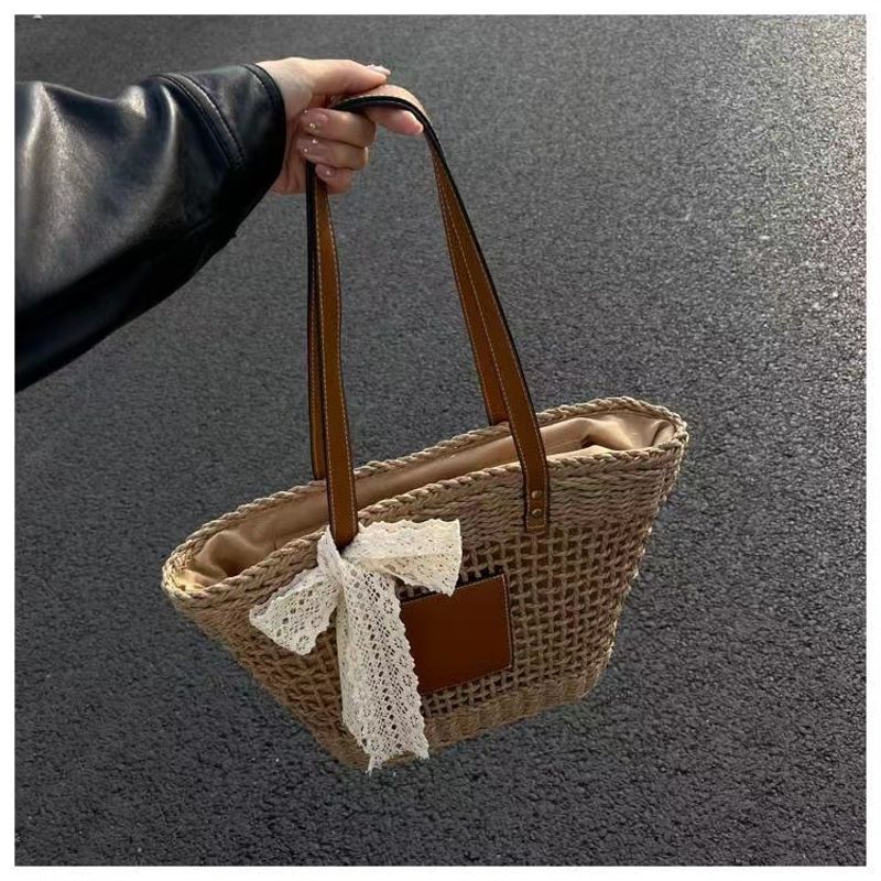 hollow shoulder new simple straw woven holiday style beach versatile women's bag_voghion.com