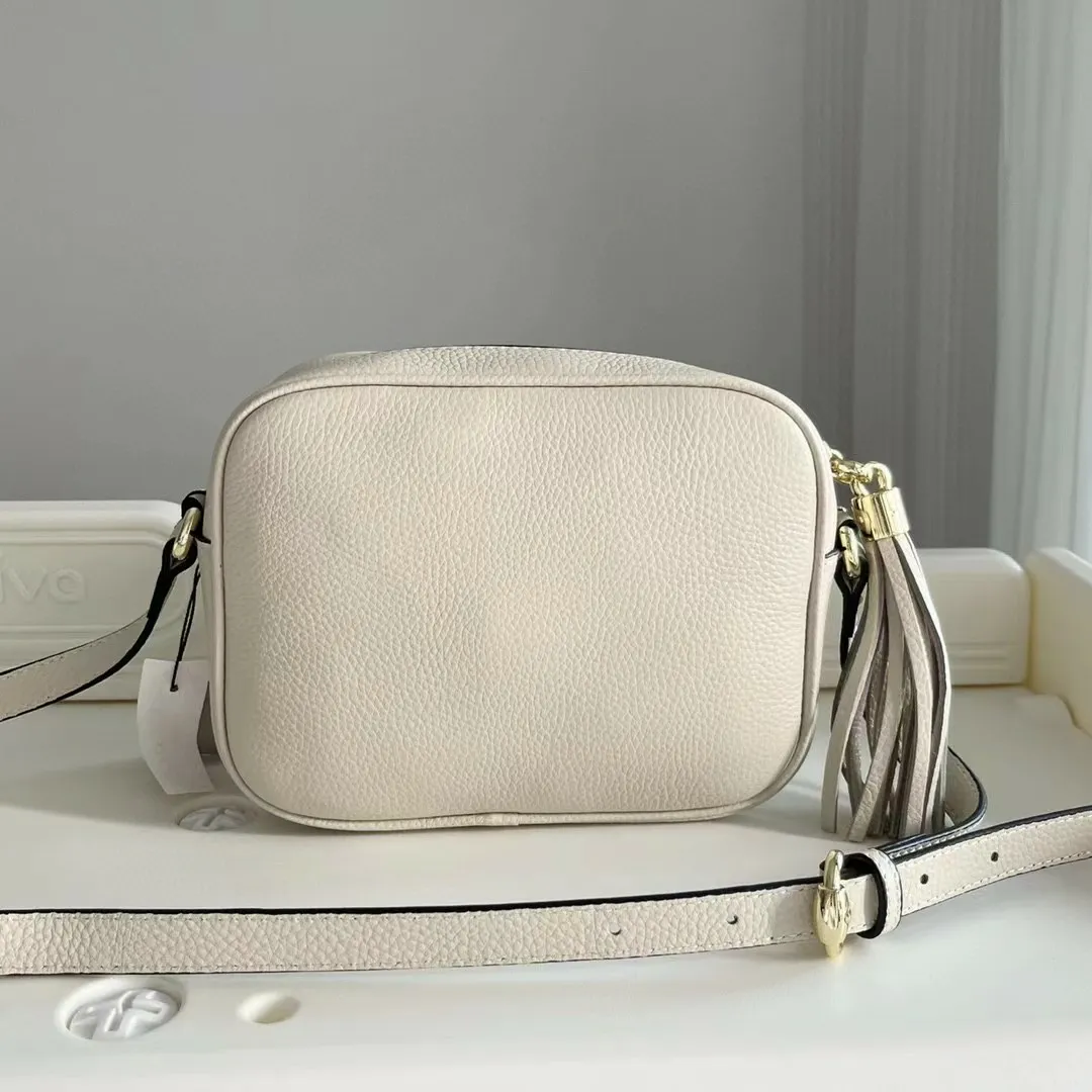 Borse per fotocamera firmate: borsa a tracolla in pelle Emed con cerniera dorata, borsa a tracolla alla moda con nappe e tracolla lunga quadrata_voghion.com