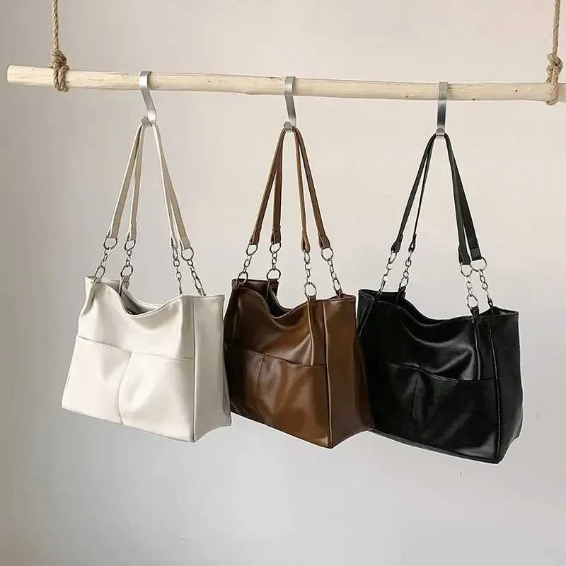 Sacs à bandoulière pour femmes Vintage Couleur unie Simple Grande capacité Grand cuir PU Les derniers sacs à main de voyage_voghion.com