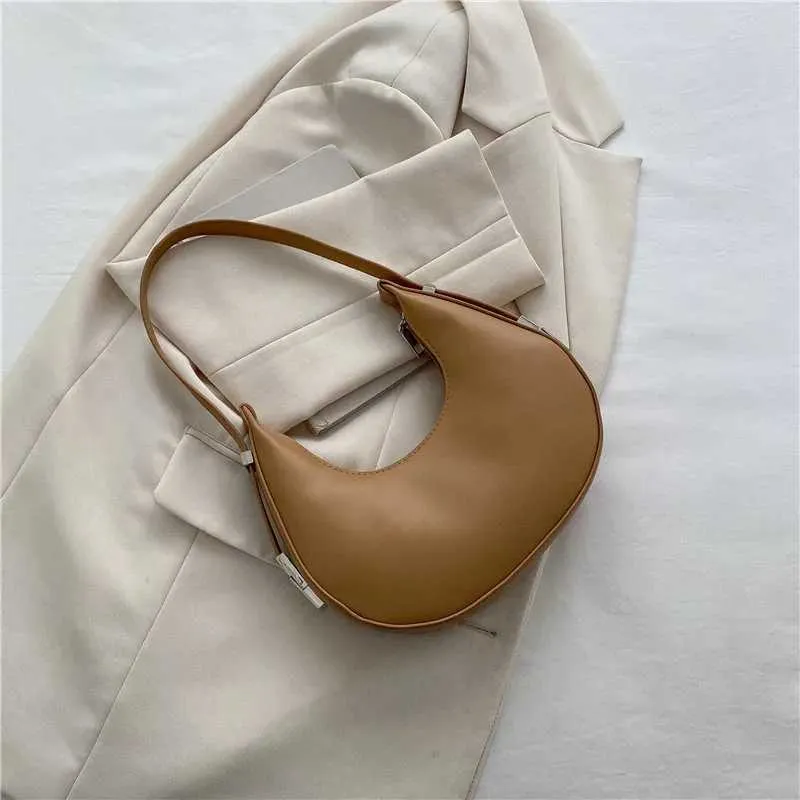 Borsa a spalla a mezzaluna donna elegante in ecopelle_voghion.com