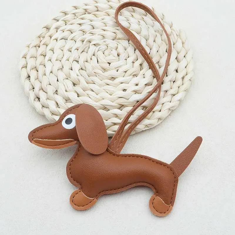 Portachiavi multicolore in pelle classica a forma di piccolo cane, simpatico ciondolo a forma di salsiccia, ciondolo per cellulare, treppiede, portachiavi, accessori_voghion.com