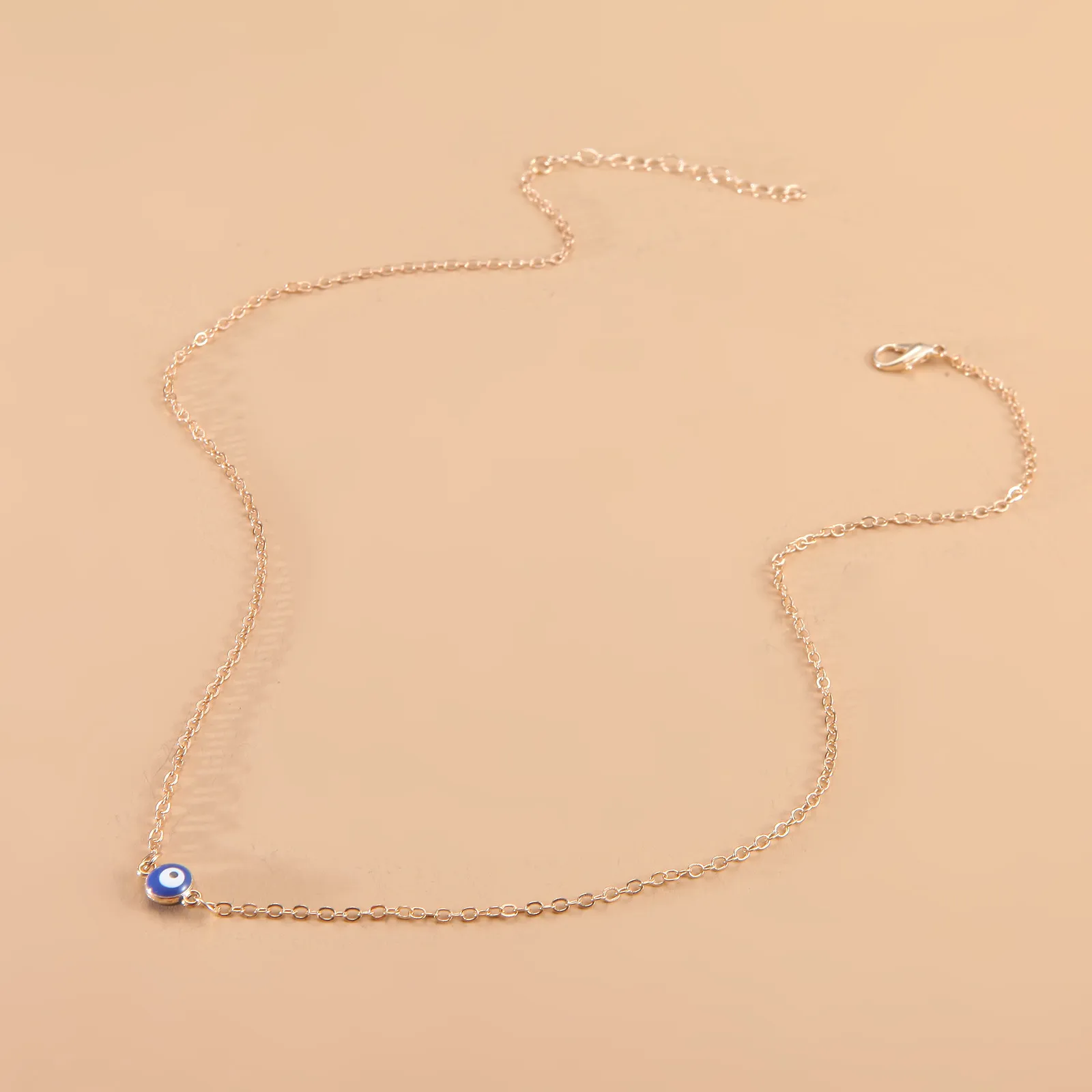 Collana con ciondolo con occhio maligno blu alla moda per le donne_voghion.com