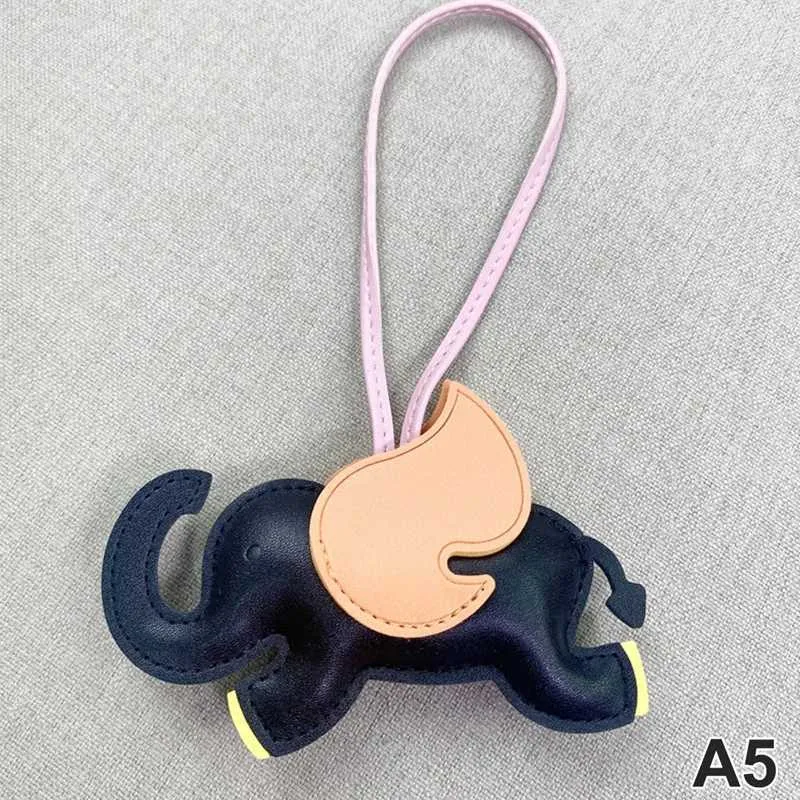Designer de modă din piele PU aripi zburătoare elefant umeraș breloc pandantiv pentru femei accesorii pentru geantă de mână_voghion.com