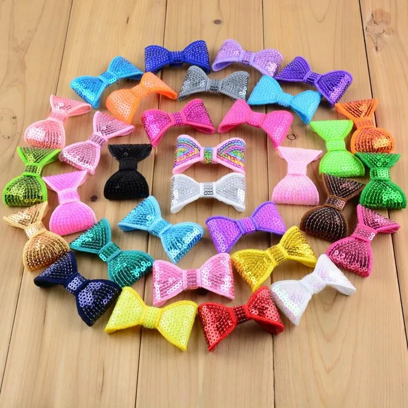 Fiocchi per capelli con paillettes ricamati per fasce_voghion.com