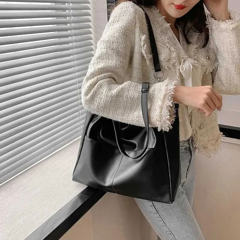 Sacs à bandoulière pour femmes Vintage Couleur unie Simple Grande capacité Grand cuir PU Les derniers sacs à main de voyage_voghion.com