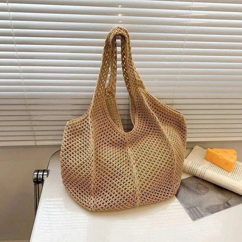 Womens crochet handbag mesh beach large capacity fashionable knitted shoulder solid color simple shopping bag Y241011_voghion.com