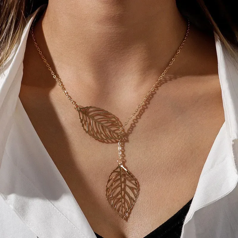 Colliers pendentifs à breloques en forme de feuilles creuses pour femmes, couleur argent doré, ras du cou de clavicule, bijoux de déclaration_voghion.com