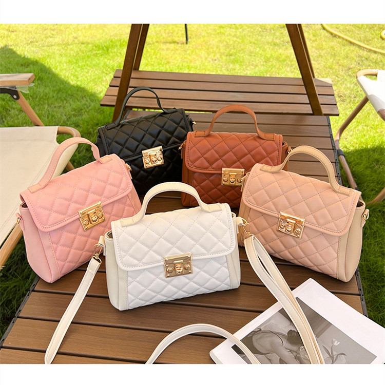 Image of Ling grid pattern Kelly bag 2023 niche design texture handbag for women's crossbody shoulder bag