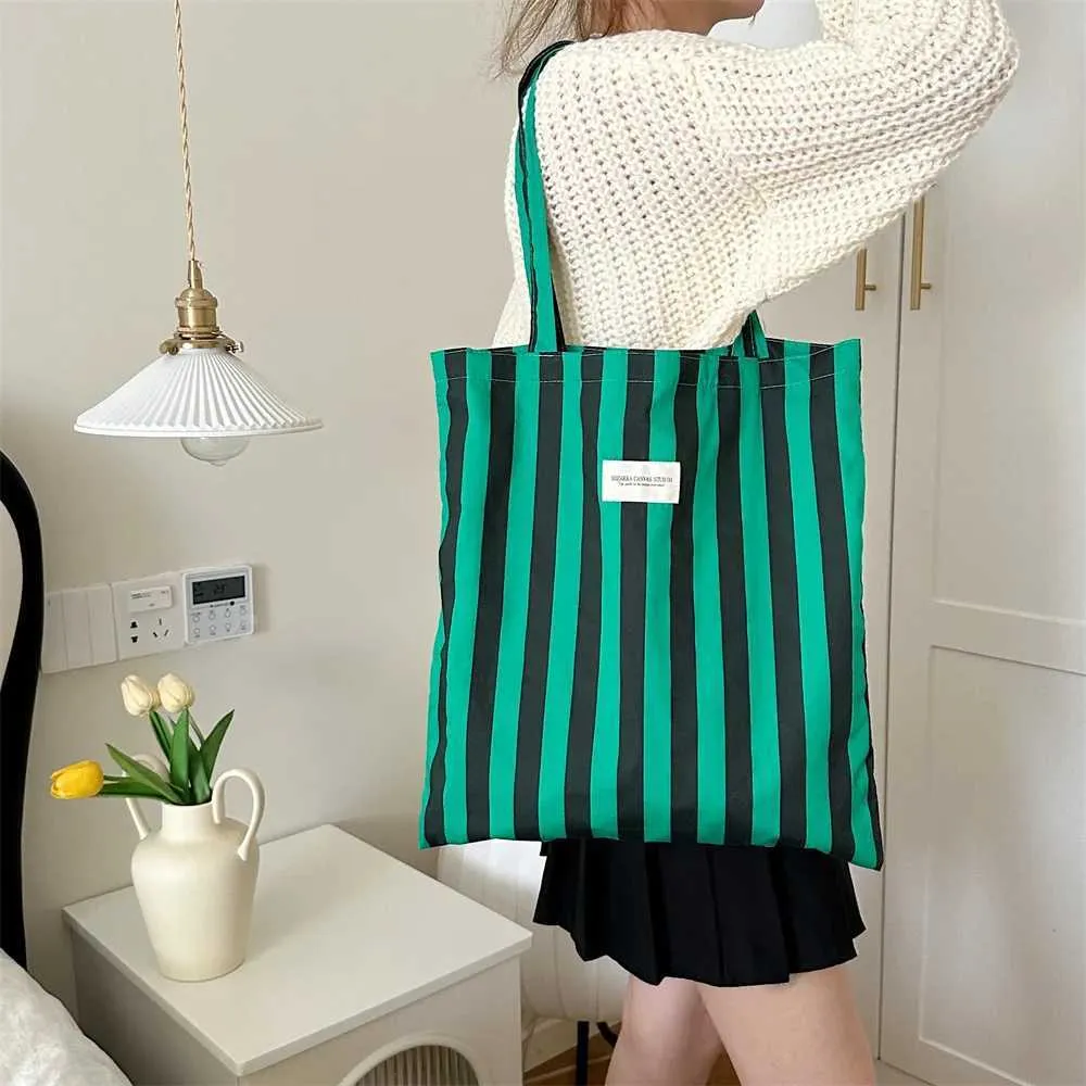 Vintage gestreifte warme Leinwand große Kapazität tägliche Einkaufstasche lässig tragbare Damen Reisehandtasche Y241109_voghion.com