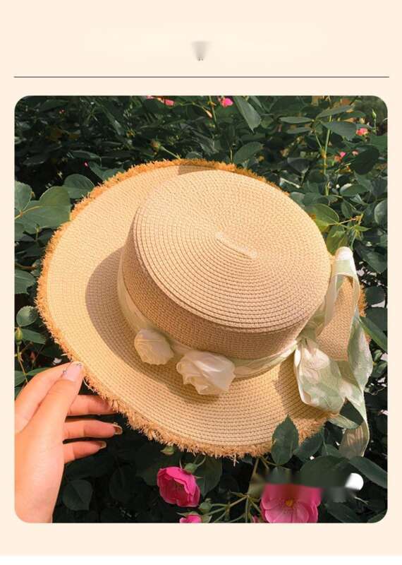 Cappello da spiaggia estivo da donna con tesa larga e fiore in paglia con fiocco e parte superiore piatta Lafite_voghion.com