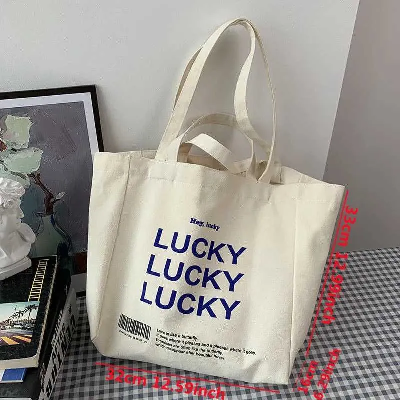 Large capacity retro letter printed canvas handbag with foldable design - perfect for casual shopping and daily use_voghion.com