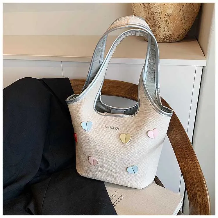 Borsa a secchiello in denim da donna con cuori grande a spalla_voghion.com