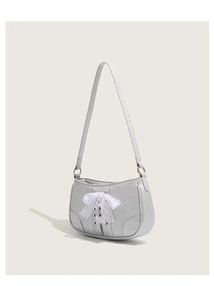 Dolce fondo con cinturino in pizzo e fiocco per donna, tendenza, monospalla, borsa a tracolla versatile e comunicativa_voghion.com