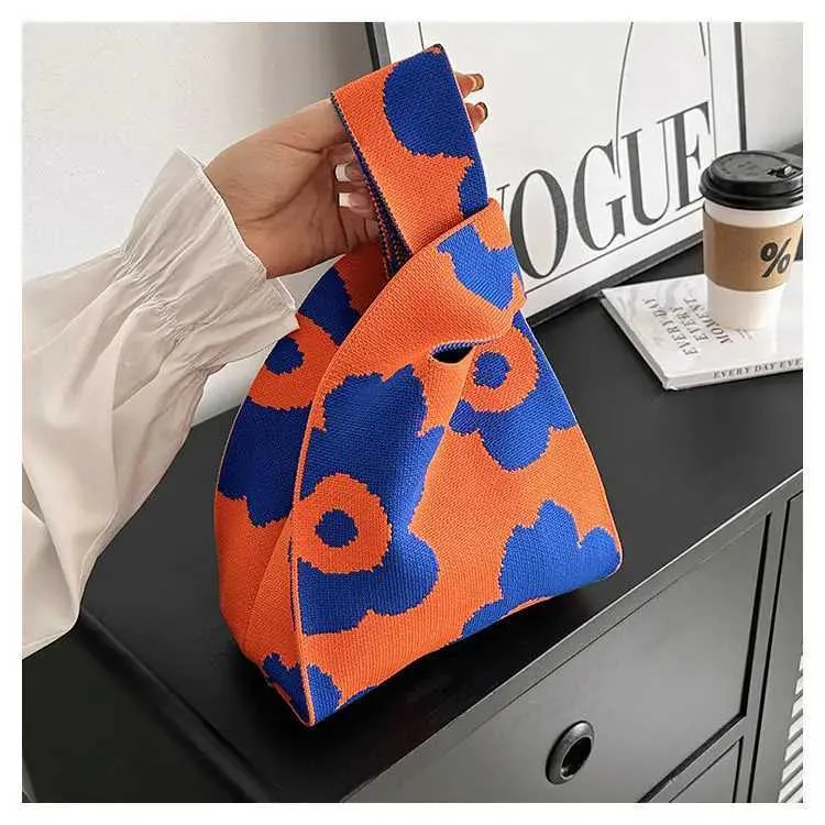 Borsa a mano in tela artistica giapponese di grande capacità, modello Geely, portafoglio con nodo casual e borsa da polso alla moda e versatile Wens_voghion.com