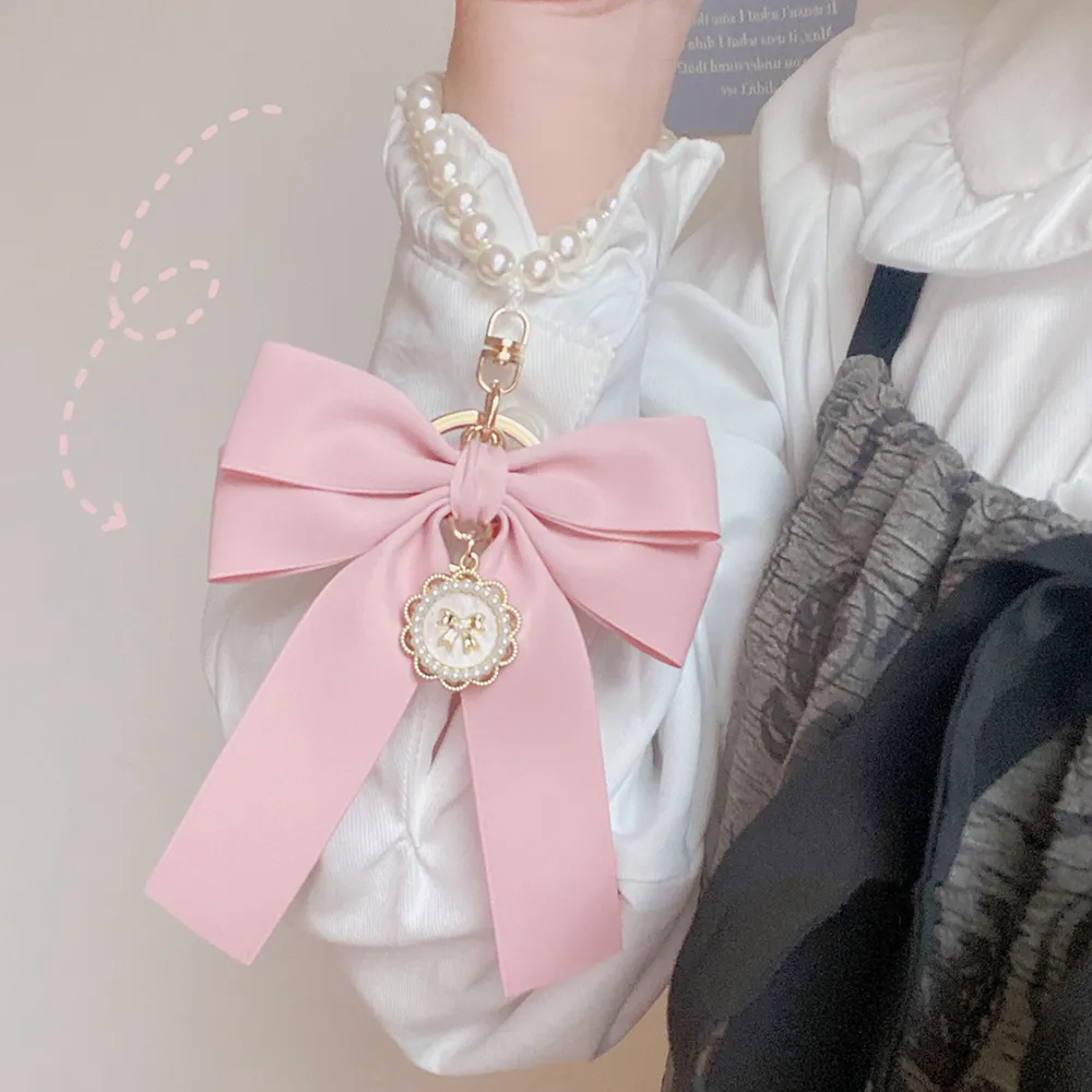 Y2K Band Bowknot Perlen Anhänger Charm Schlüsselanhänger Elegantes Perlenarmband Schlüsselanhänger Süße Kette Handy Schlüsseltasche Behänge_voghion.com