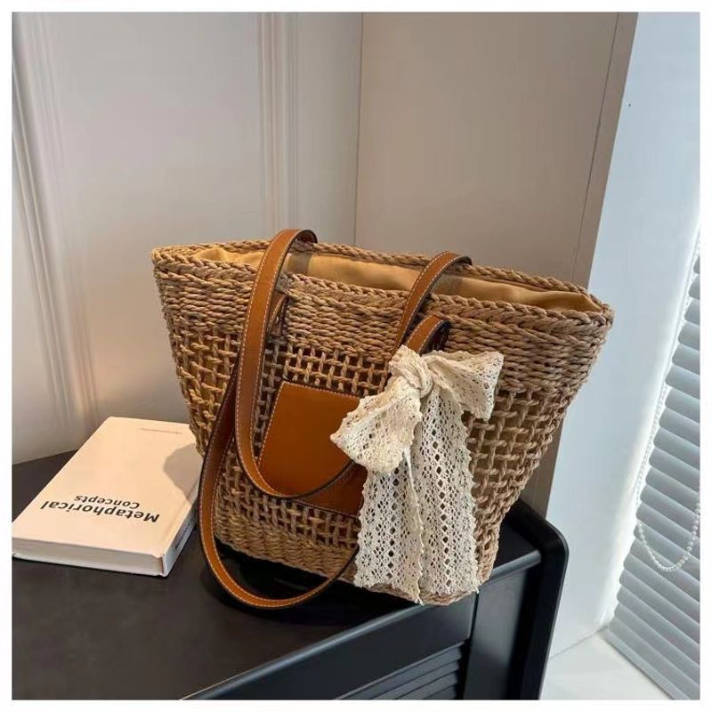 hollow shoulder new simple straw woven holiday style beach versatile women's bag_voghion.com