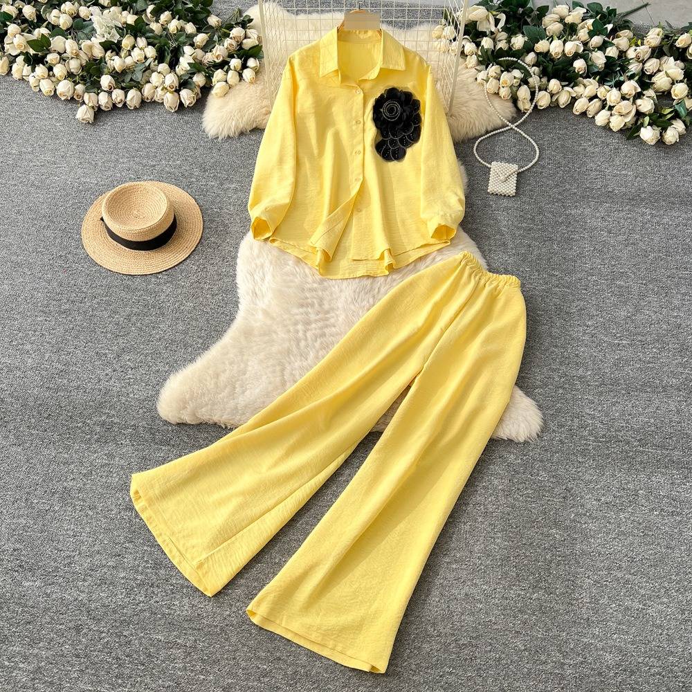 Completo elegante blusa floreale e pantaloni gamba larga donna_voghion.com