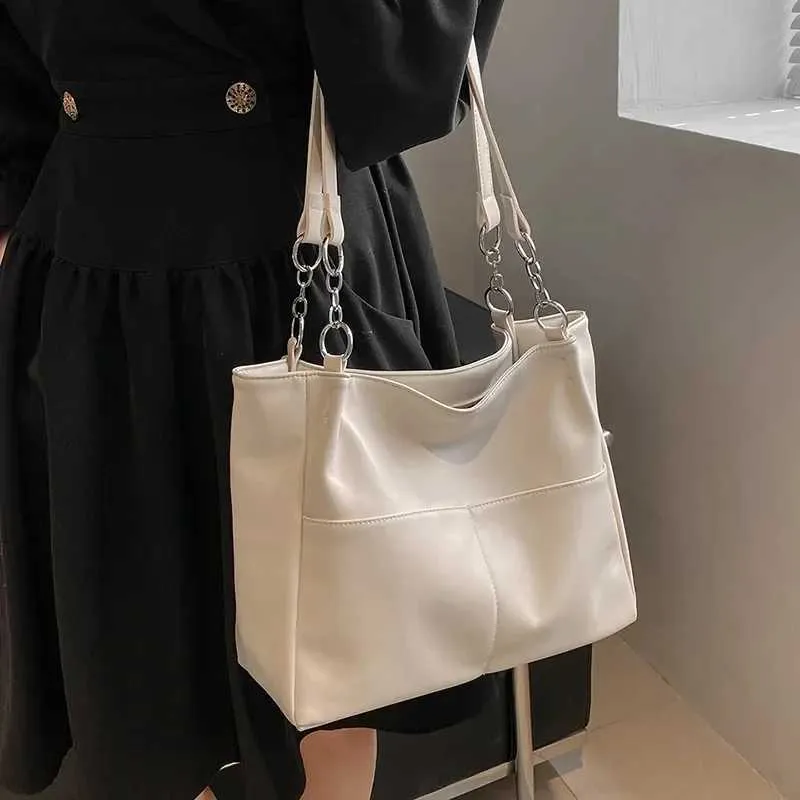 Sacs à bandoulière pour femmes Vintage Couleur unie Simple Grande capacité Grand cuir PU Les derniers sacs à main de voyage_voghion.com