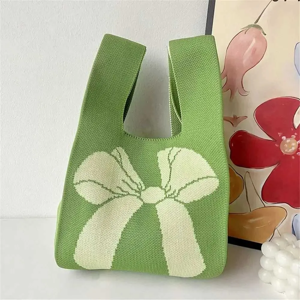 Gebreide shopper met strik, handgemaakte tas voor dames_voghion.com