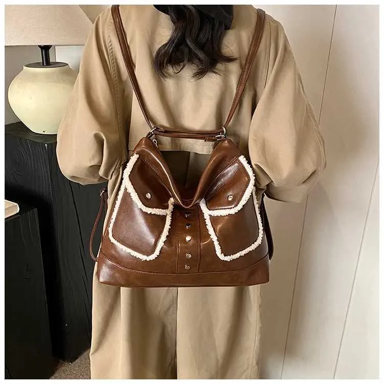 Vintage Women's Shoulder Bag And Backpack In Lamb Fleece And Pu_voghion.com